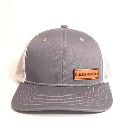 Ducks and geese leather patch trucker hat