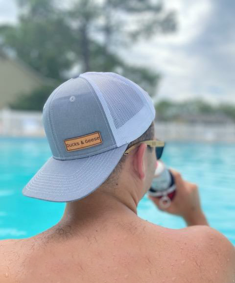 Leather patch trucker hat